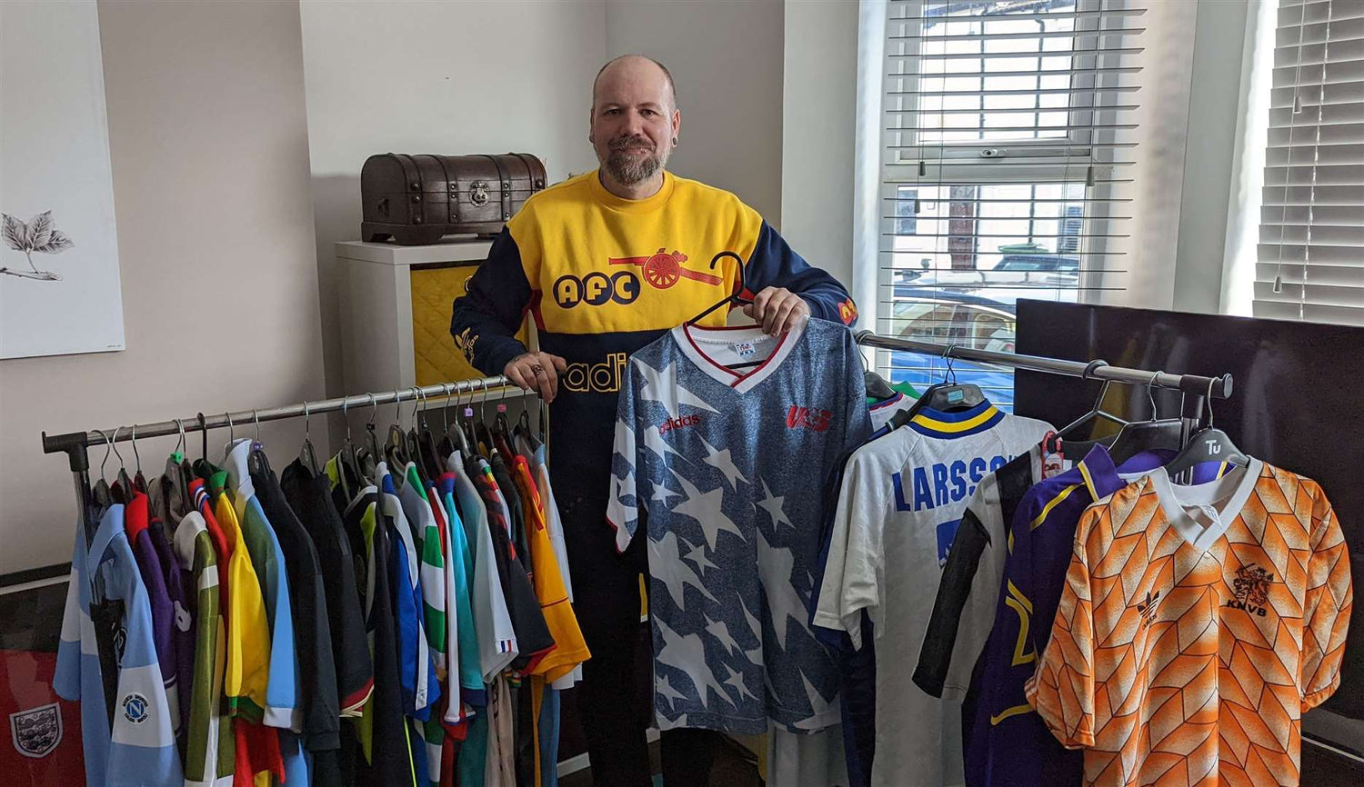 image showing classic retro football shirts collector with his collection of football shirts