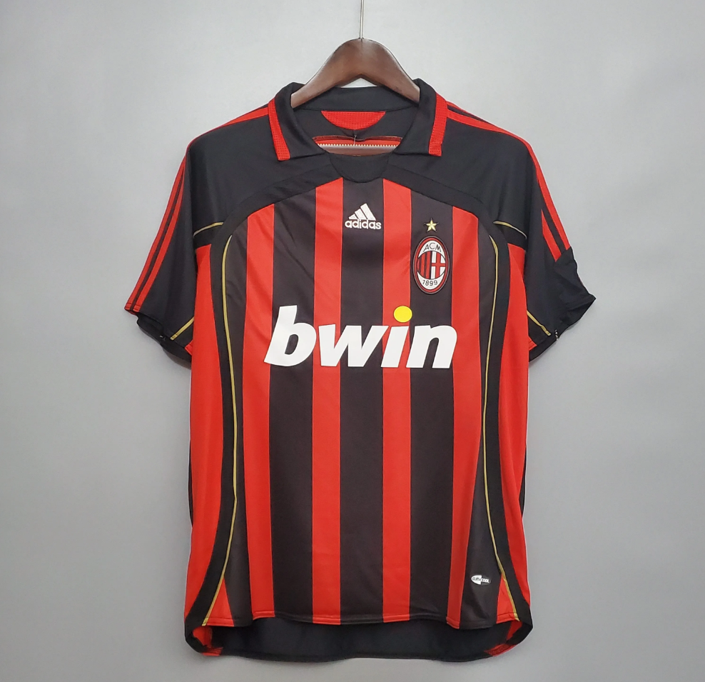 Ac Milan 2006 - 2007 home jersey, featuring black and red stripes with the AC Milan logo and the word &