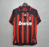 Ac Milan 2006 - 2007 home jersey, featuring black and red stripes with the AC Milan logo and the word &